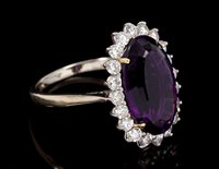 Lot 479 - Amethyst and diamond cluster cocktail ring...