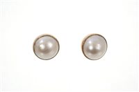 Lot 482 - Pair cultured Mabe pearl ear studs in yellow...