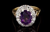 Lot 493 - Amethyst and diamond cluster ring, the oval...