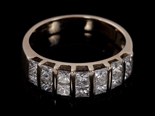 Lot 472 - 18ct white gold diamond half eternity ring...