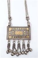 Lot 758 - Antique Islamic silver and gilt heightened...