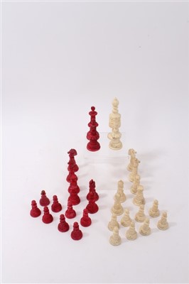 Lot 604 - 19th century Anglo-Indian carved and stained bone chess set