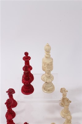 Lot 604 - 19th century Anglo-Indian carved and stained bone chess set