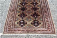 Lot 1394 - Tekke style part silk rug with two rows of...