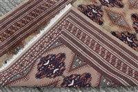 Lot 1394 - Tekke style part silk rug with two rows of...