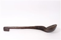 Lot 789 - African tribal carved wood ladle, carved from...