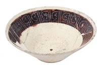 Lot 105 - 10th century Northern Iranian brown and white...