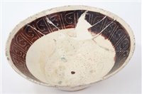 Lot 105 - 10th century Northern Iranian brown and white...