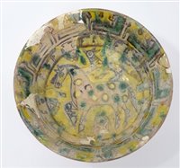 Lot 106 - 10th century Nishapur pottery bowl with yellow...