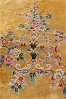 Lot 1384 - Very large Chinese wool rug with Oriental...