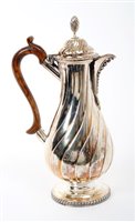 Lot 265 - Victorian silver hot water jug of baluster...