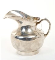 Lot 331 - Mexican silver cream jug of compressed...