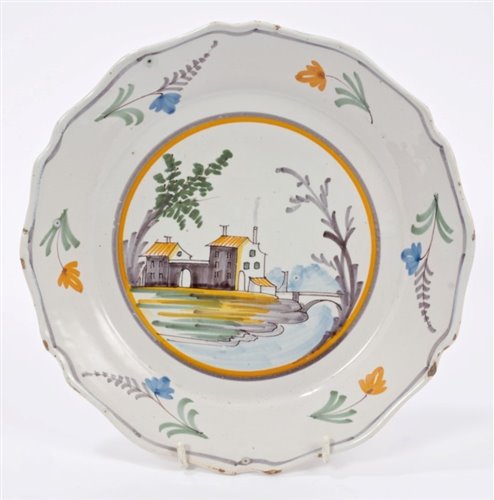 Lot 46 - 18th century French faience plate painted with...