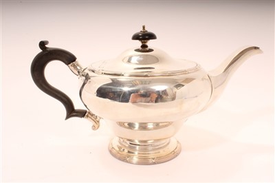 Lot 259 - George V silver teapot of inverted baluster...