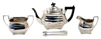 Lot 256 - 1920s three piece silver tea set - comprising...