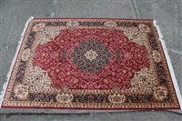 Lot 1392 - Kashan style carpet, central petalled...
