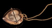 Lot 423 - Late Victorian 15ct gold heart shape portrait...