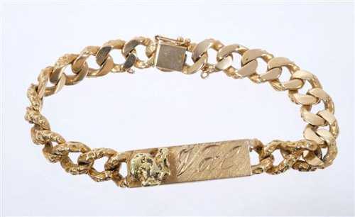 Lot 589 - Gold identity bracelet with applied gold...