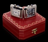 Lot 464 - Cartier dual time travel alarm clock, the two...