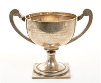 Lot 246 - 1920s silver two-handled trophy cup on a...