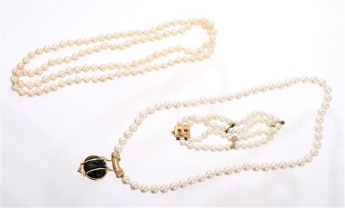 Lot 535 - Cultured pearl opera length necklace with a...