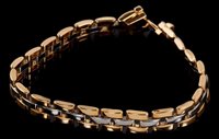 Lot 440 - Cartier two-colour gold bracelet with white...