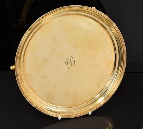 Lot 444 - Cartier 9ct gold tray/salver of circular form...