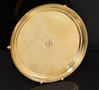 Lot 444 - Cartier 9ct gold tray/salver of circular form...