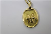 Lot 445 - Cartier 18ct gold Zodiac pendant necklace, the...