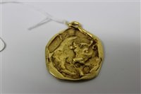 Lot 446 - Cartier 18ct gold Zodiac pendant, cast in...