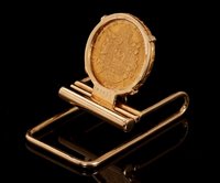 Lot 448 - Cartier 18ct gold money clip with a Napoleon...