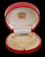 Lot 462 - Cartier diamond and pearl bracelet with six...