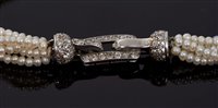 Lot 462 - Cartier diamond and pearl bracelet with six...