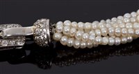 Lot 462 - Cartier diamond and pearl bracelet with six...