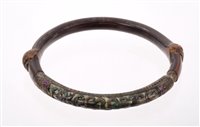 Lot 3248 - Antique Tibetan silver and bamboo bangle, the...