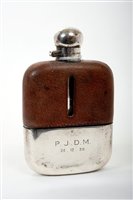 Lot 216 - 1930s glass spirit flask with pigskin leather...