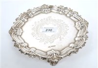 Lot 230 - Edwardian silver card tray of circular form,...