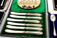 Lot 192 - Two cased sets of silver-handled tea knives,...