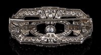 Lot 467 - Art Deco diamond brooch, the openwork...