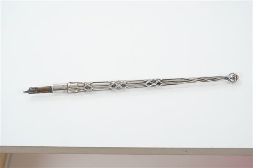 Lot 365 - 1920s Omar Ramsden silver dip pen of slender...