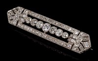 Lot 474 - Art Deco diamond plaque brooch, the openwork...