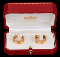 Lot 459 - Pair of Cartier 18ct yellow gold 'Love'...