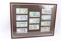 Lot 201 - G.B. mixed One Pound banknotes set in glazed...