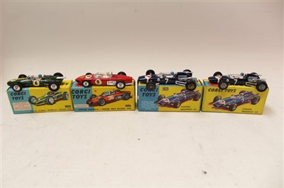 Lot 2717 - Corgi Lotus-Climax F1 Racing Car no. 155, Cooper Maserati F/1 no. 156 (x 2), Ferrari Formula 1 GP Racing Car no. 154, all boxed (4)