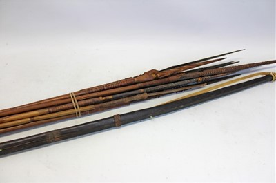 Lot 3523 - African tribal bow and thirteen arrows / spears