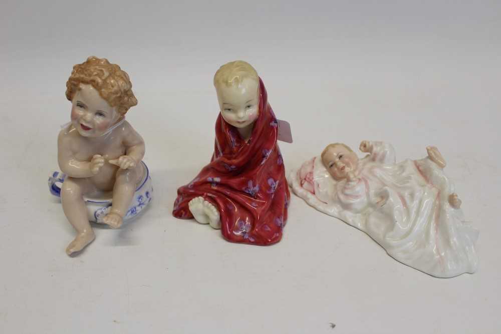 Lot 2107 - Three Royal Doulton figures - This Little Pig HN1793, Well Done HN3362 and New Baby HN3712