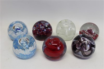 Lot 2101 - Seven Caithness glass paperweights - including Extravaganza, Swirly Whirly and Crucible