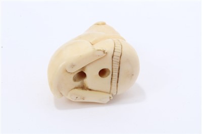 Lot 966 - Meiji period Japanese ivory netsuke in the form of a puppy
