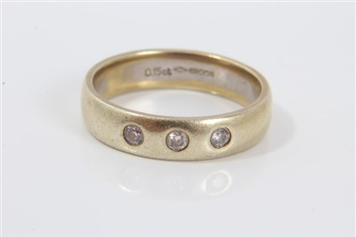 Lot 3223 - Gold (9ct) diamond three stone ring, estimated to weigh 0.15cts in total. Ring size R