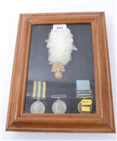 Lot 511 - Korean War Medal Pair mounted in glazed case
